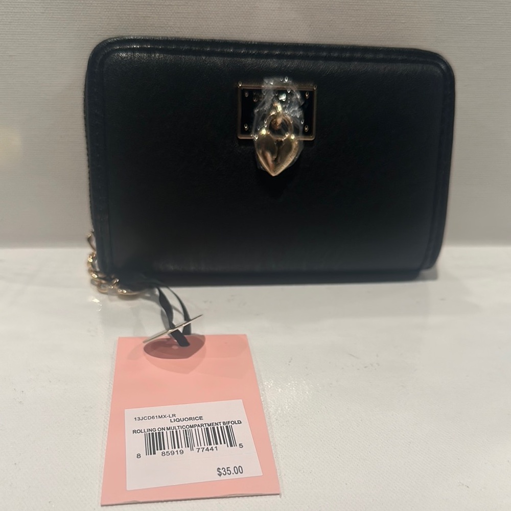 NWT Juicy Couture Bifold Black Wallet with Creditcards, Bills and Coin Slots.